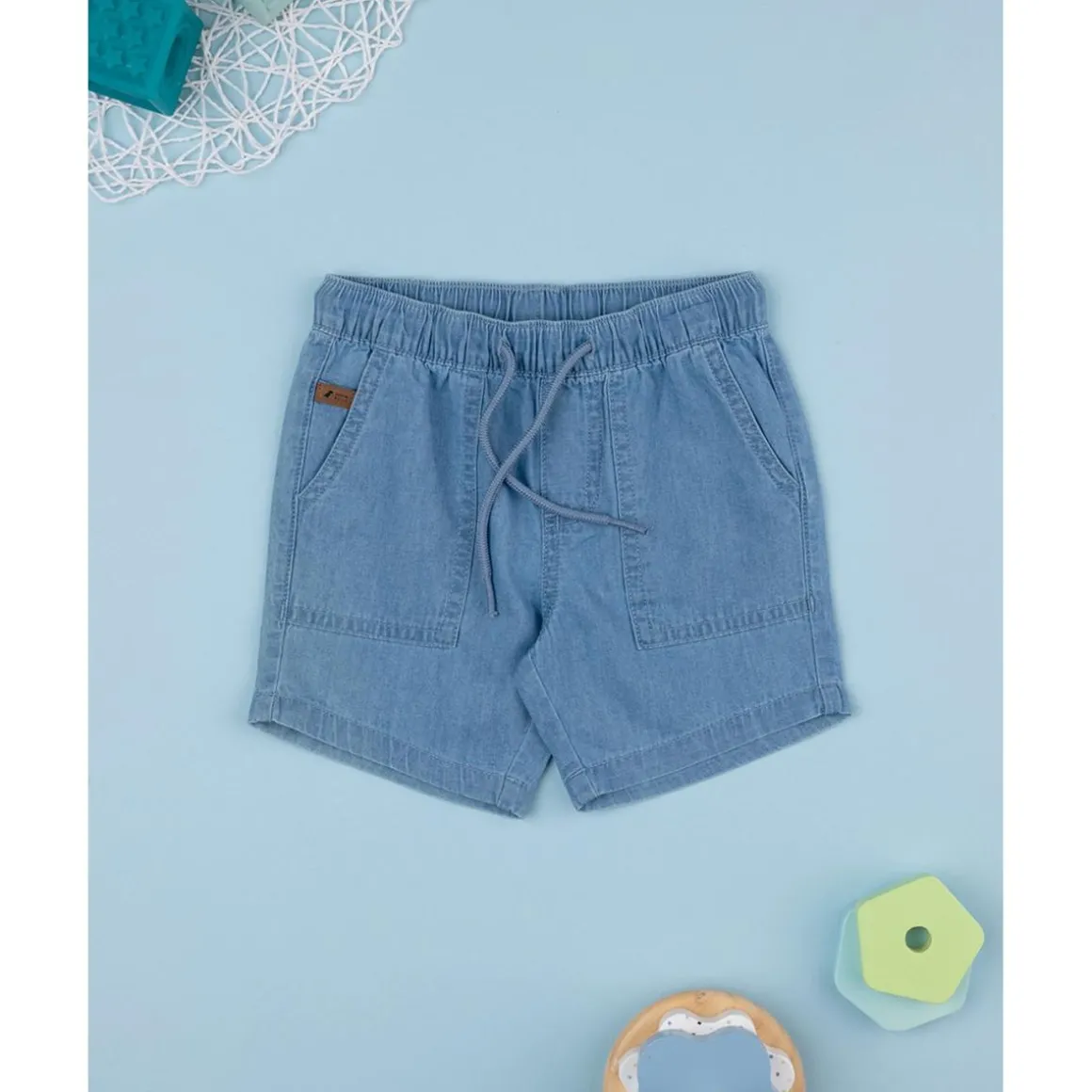 Bermuda azul denim con bolsillos
