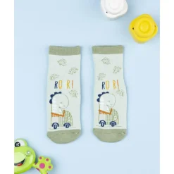 Calcetines antideslizantes de niño verdes con dinosaurio