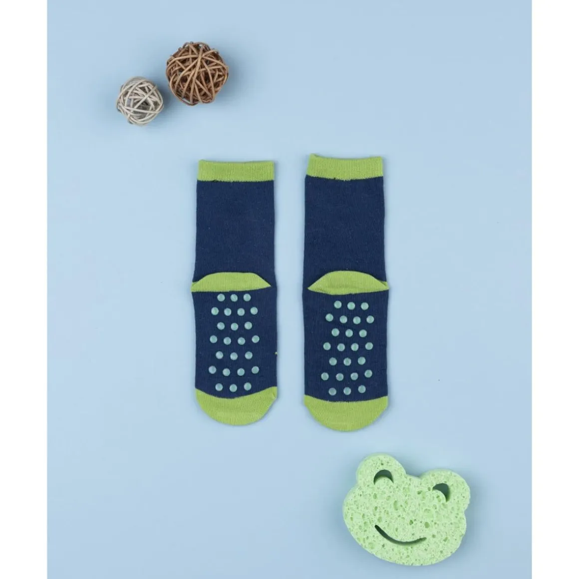 Calcetines antideslizantes azul con dinosaurio