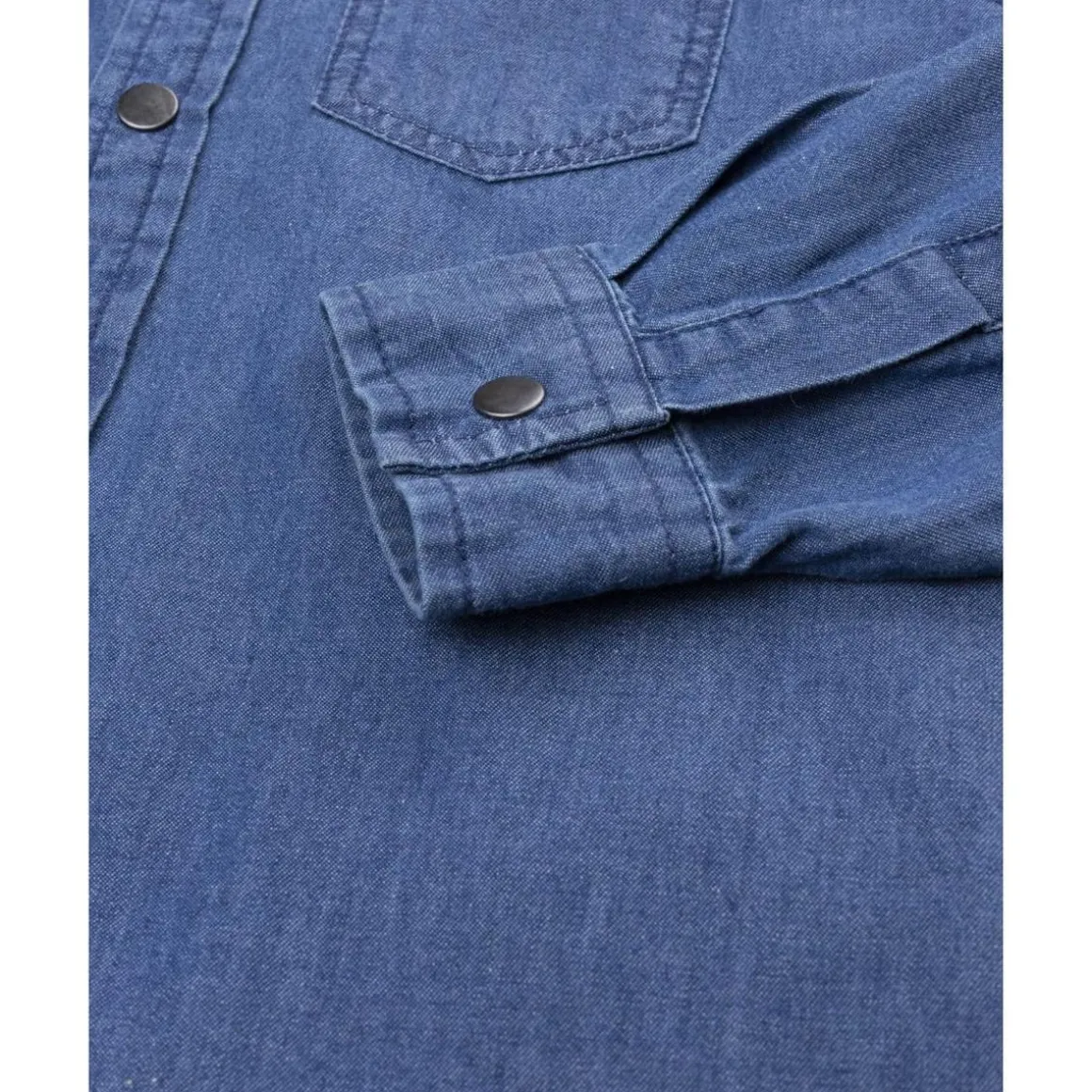 Camisa niño en denim azul con bolsillos