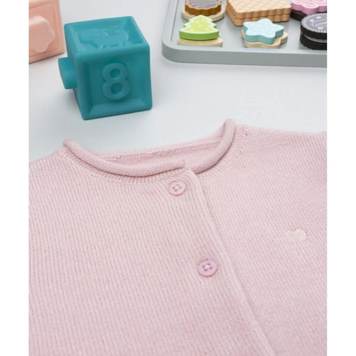 Cardigan rosa de punto con cuello redondo para niña