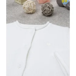 Chaqueta de punto blanca para niña