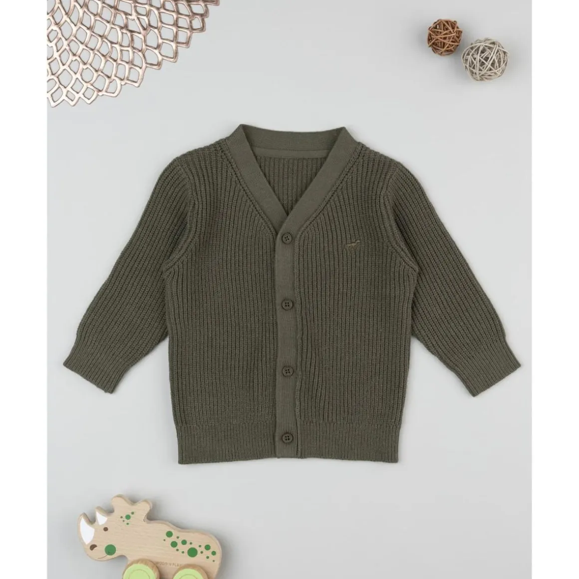 Cárdigan de niño verde tricotado