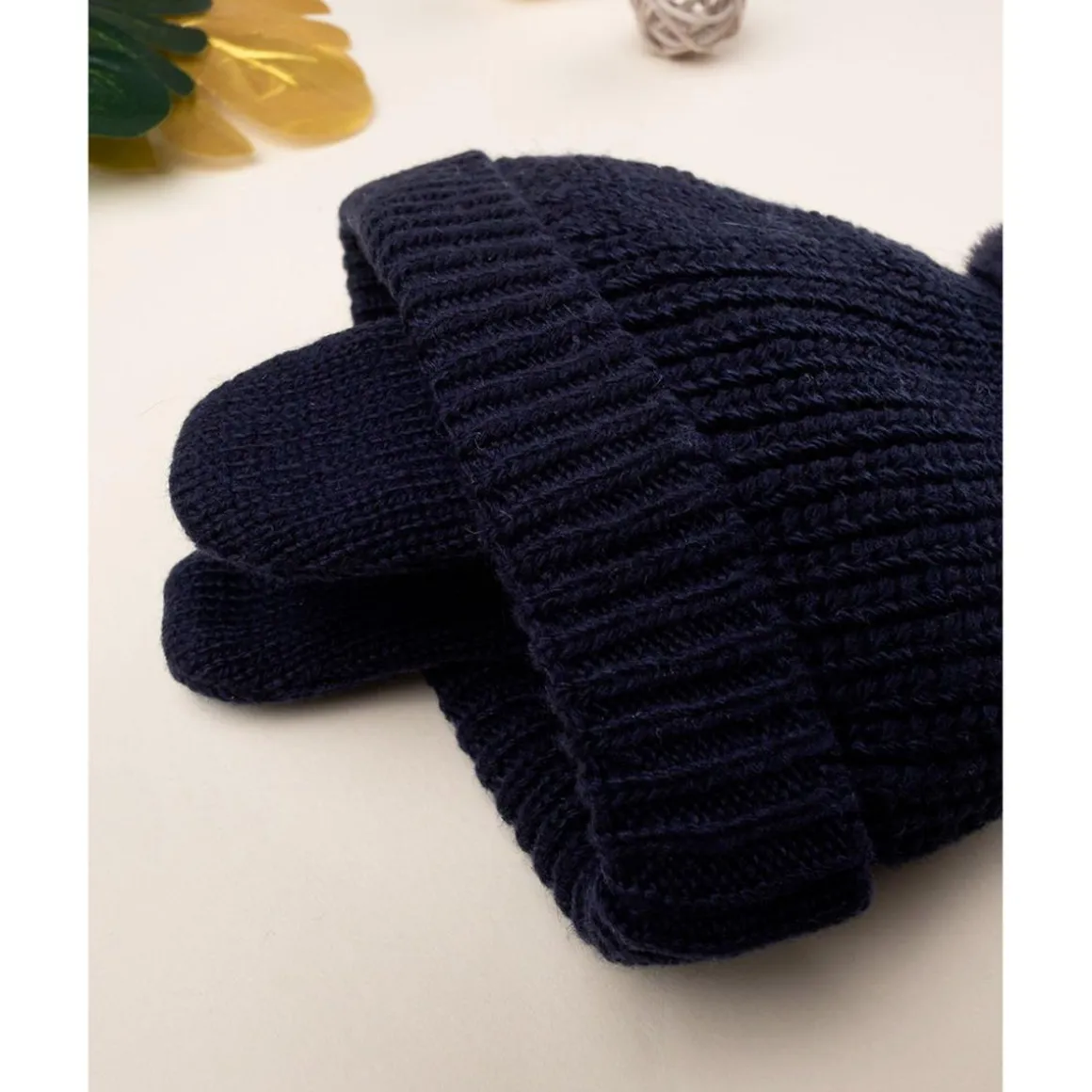 Gorro de lana con pompón de pelo