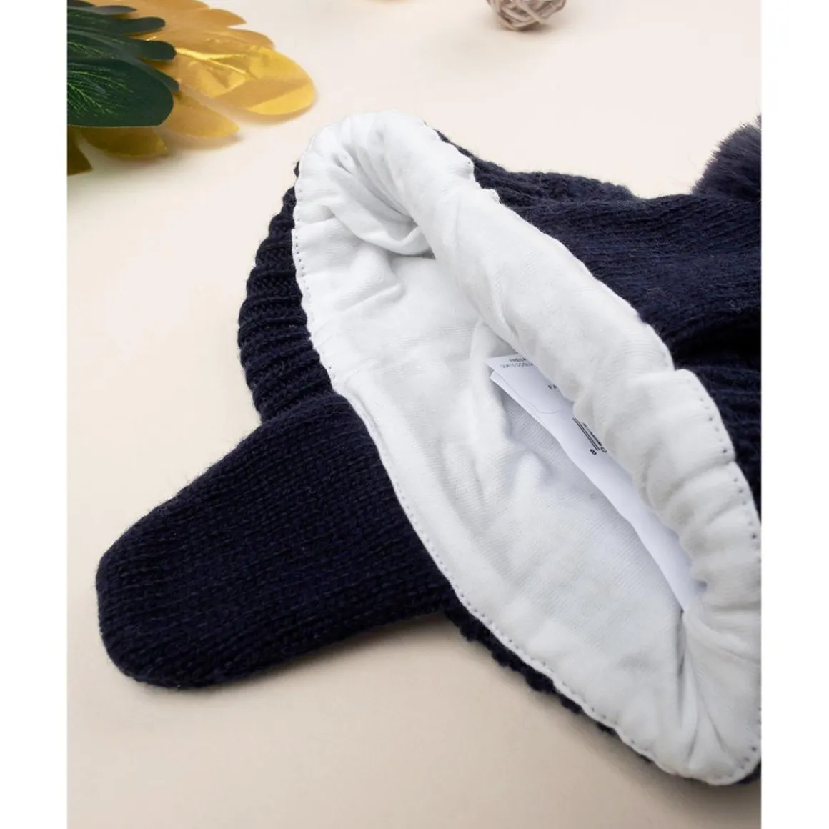Gorro de lana con pompón de pelo
