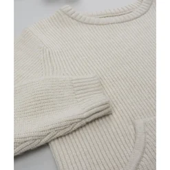 Jersey de niño beige con bolsillo