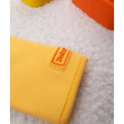 Mameluco unisex amarillo baby smile