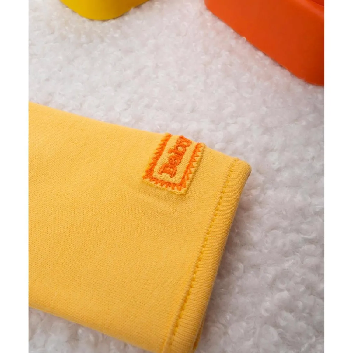 Mameluco unisex amarillo baby smile