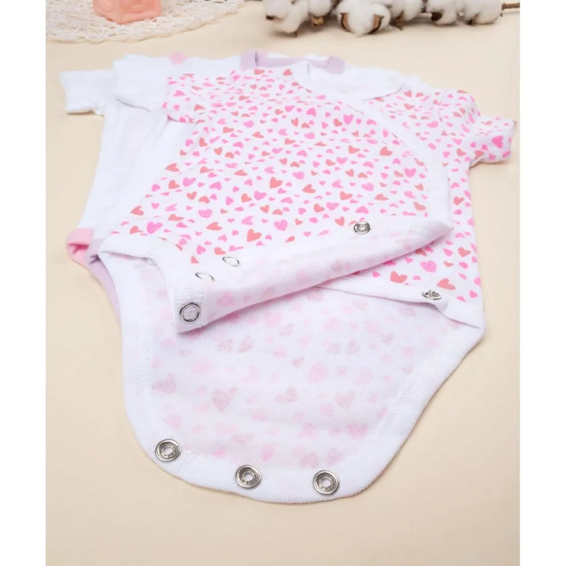 Pack de 5 bodies cruzados para niña