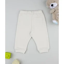 Pantalón beige con estampado para niño