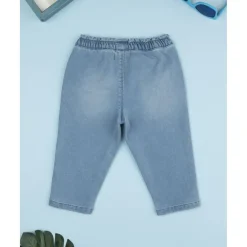 Pantalón denim claro niña con flores bordadas