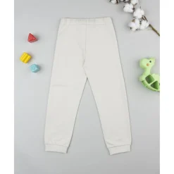 Pantalones niño beige estampado relieve