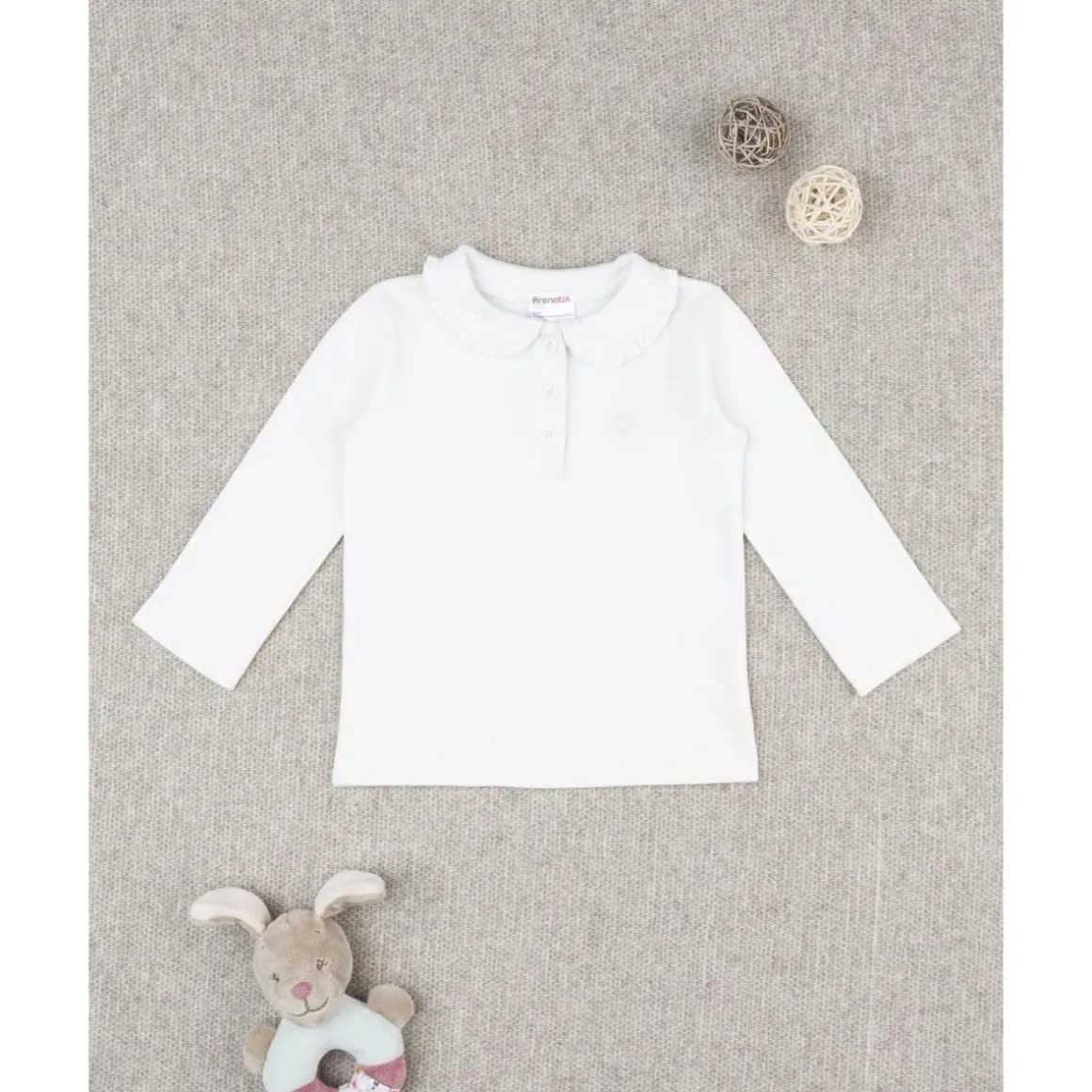 Polo blanco de niña de manga larga