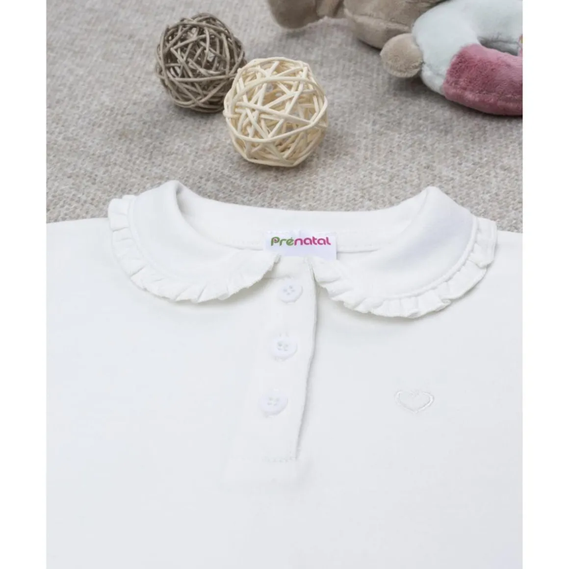 Polo blanco de niña de manga larga