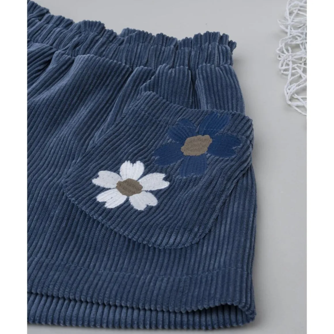 Shorts niña azul con flores